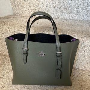 Coach purse - green with purple inside